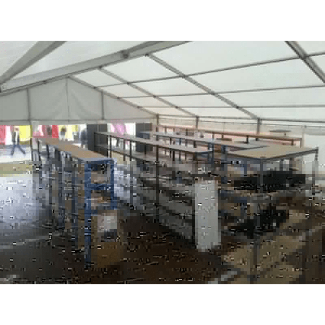 RackZone Value Shelving 5 Bay units installed under a large white event tent.