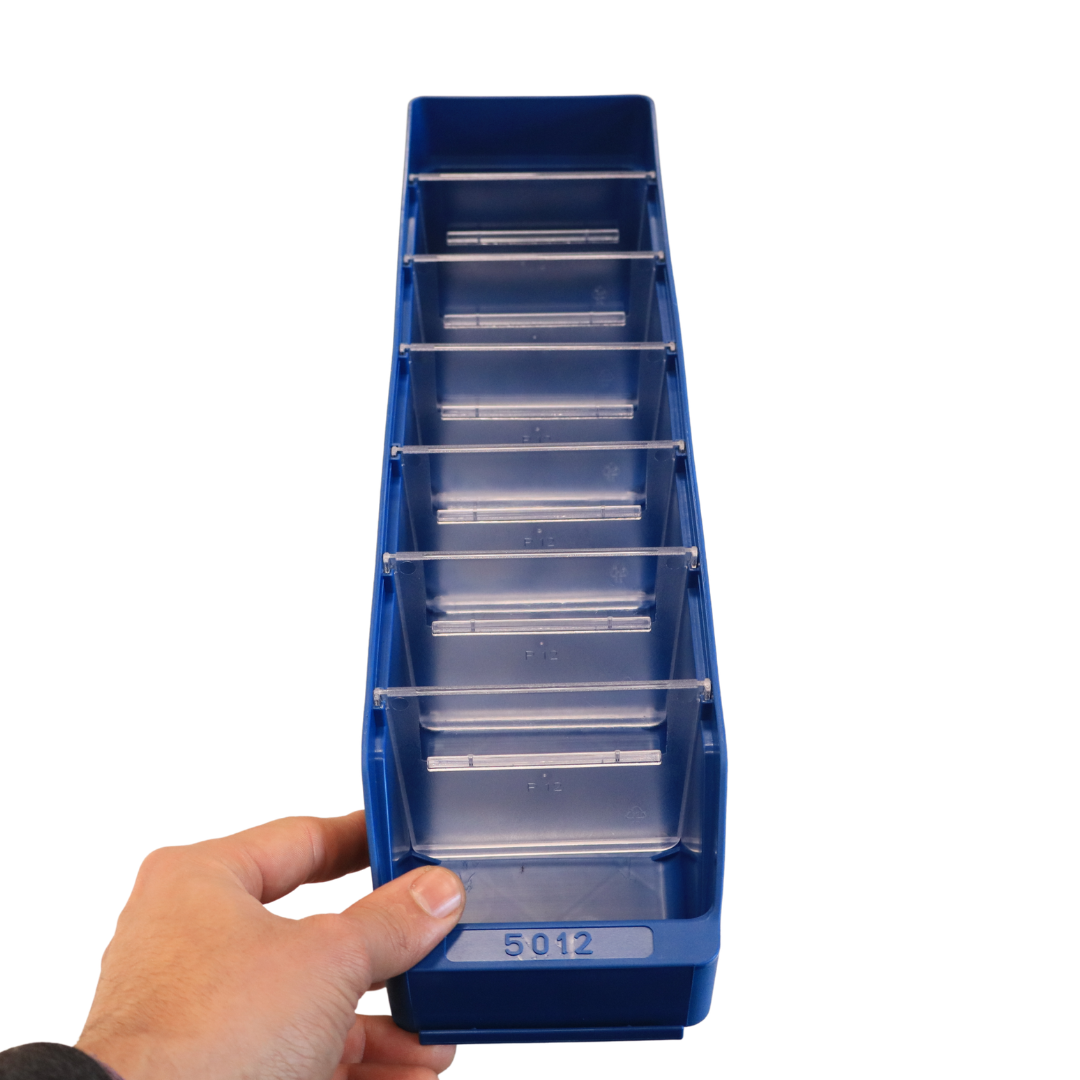 A hand holds RackZone’s Standard Shelf Bin ST5012, a blue storage bin.