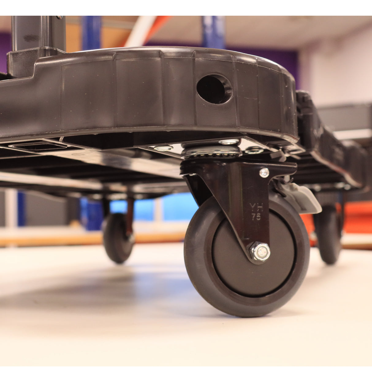 Close-up of RackZone Foldable Picking Crate Dolly c/w Handle 48L, four wheels.