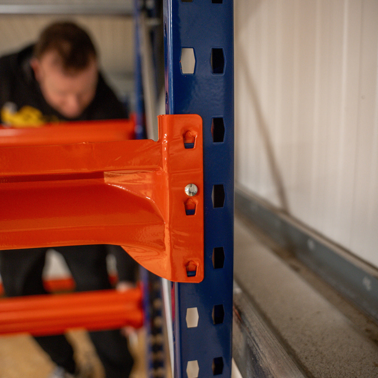 A RackZone Longspan Shelving 400mm Starter is assembled in the background.