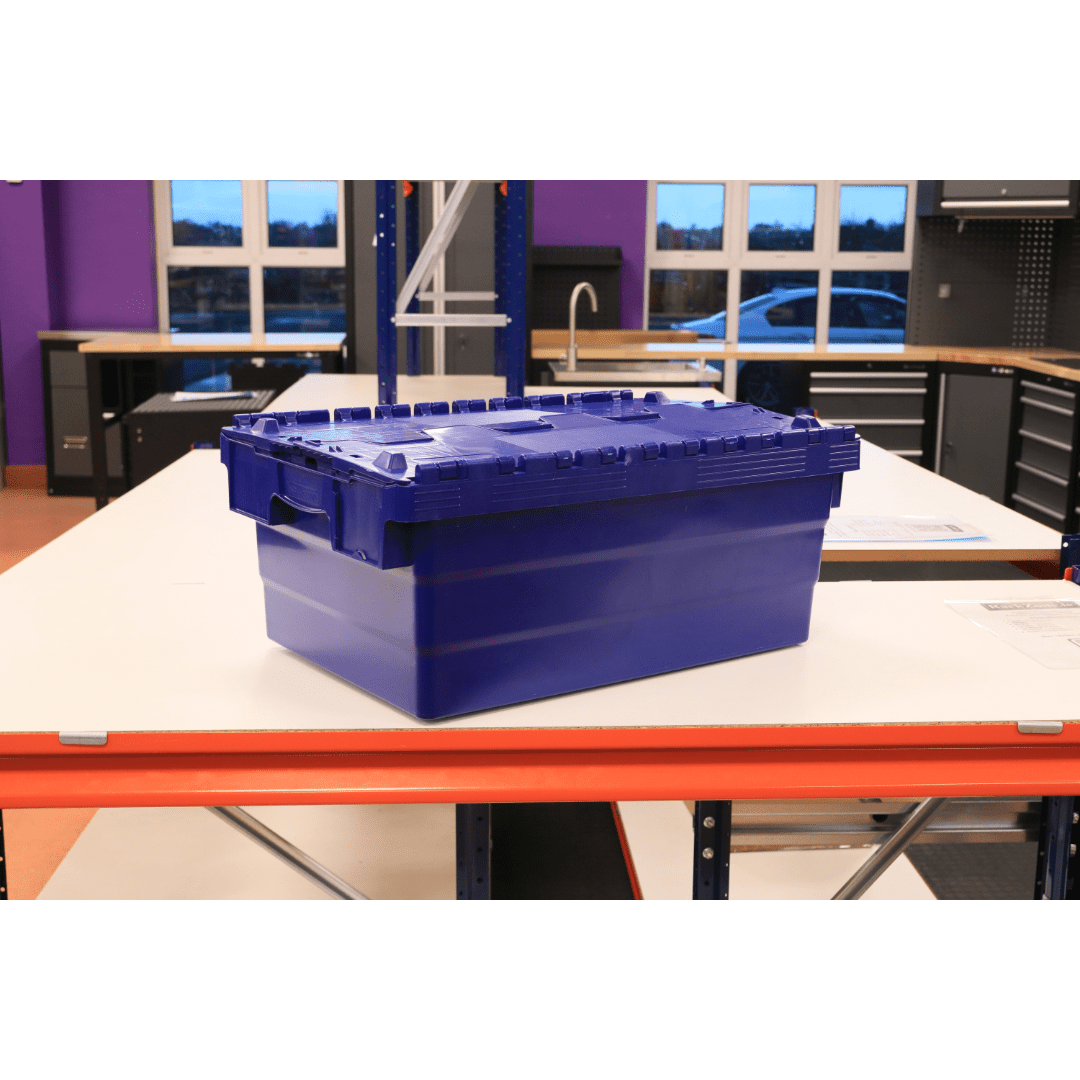 A RackZone 33L Attached Lid Container sits on a workbench in the workshop.