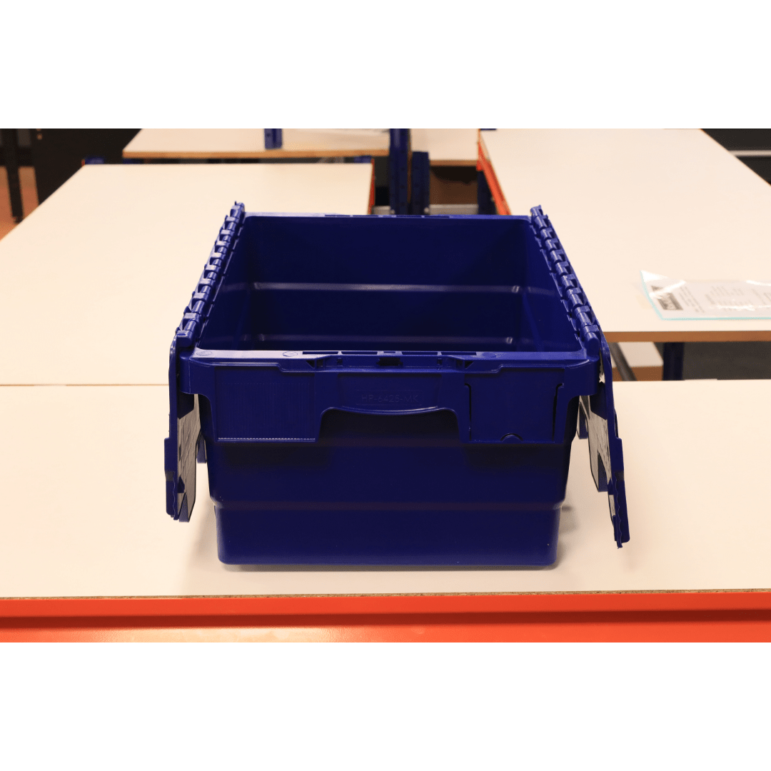 A RackZone 33L blue attached lid container sits open on a white table.