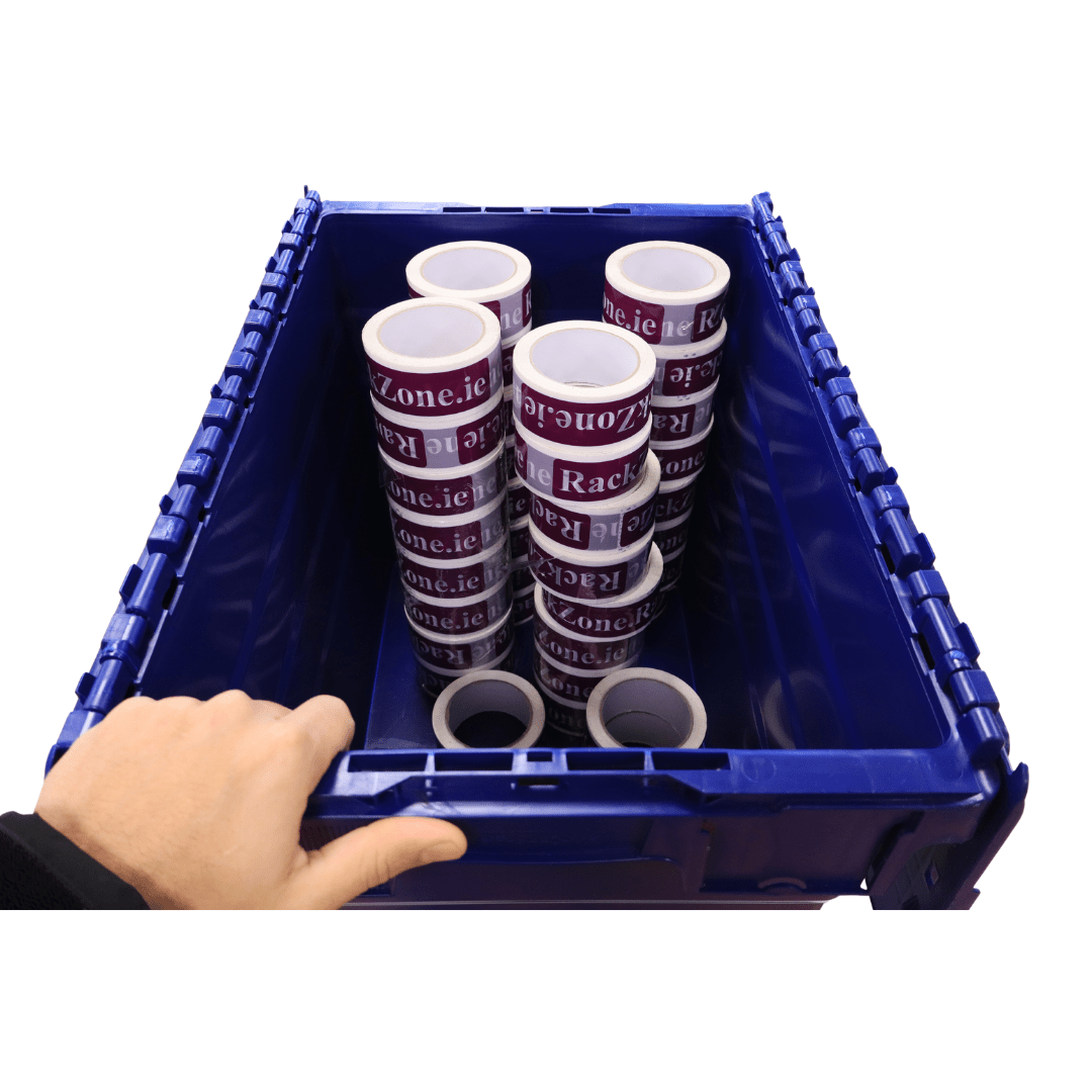 A hand holds a RackZone 75L blue attached lid container with packing tape rolls.