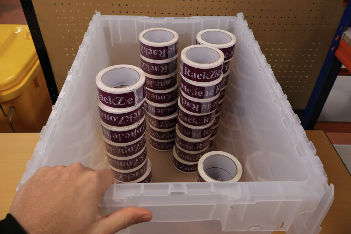 A hand holds a RackZone 75L attached lid container filled with tape rolls.
