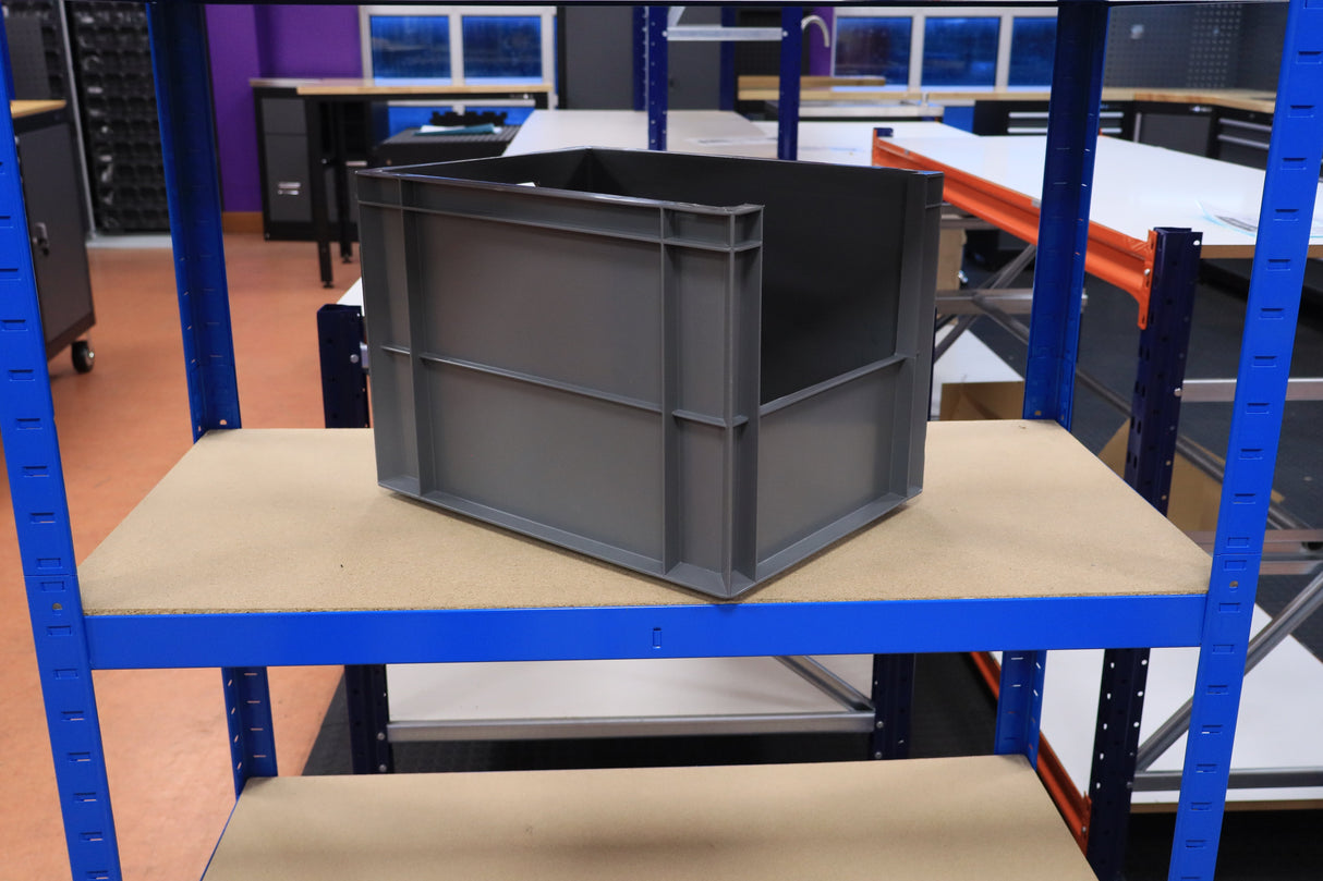 A RackZone grey Euro Picking Container on a blue metal shelf in a workshop.