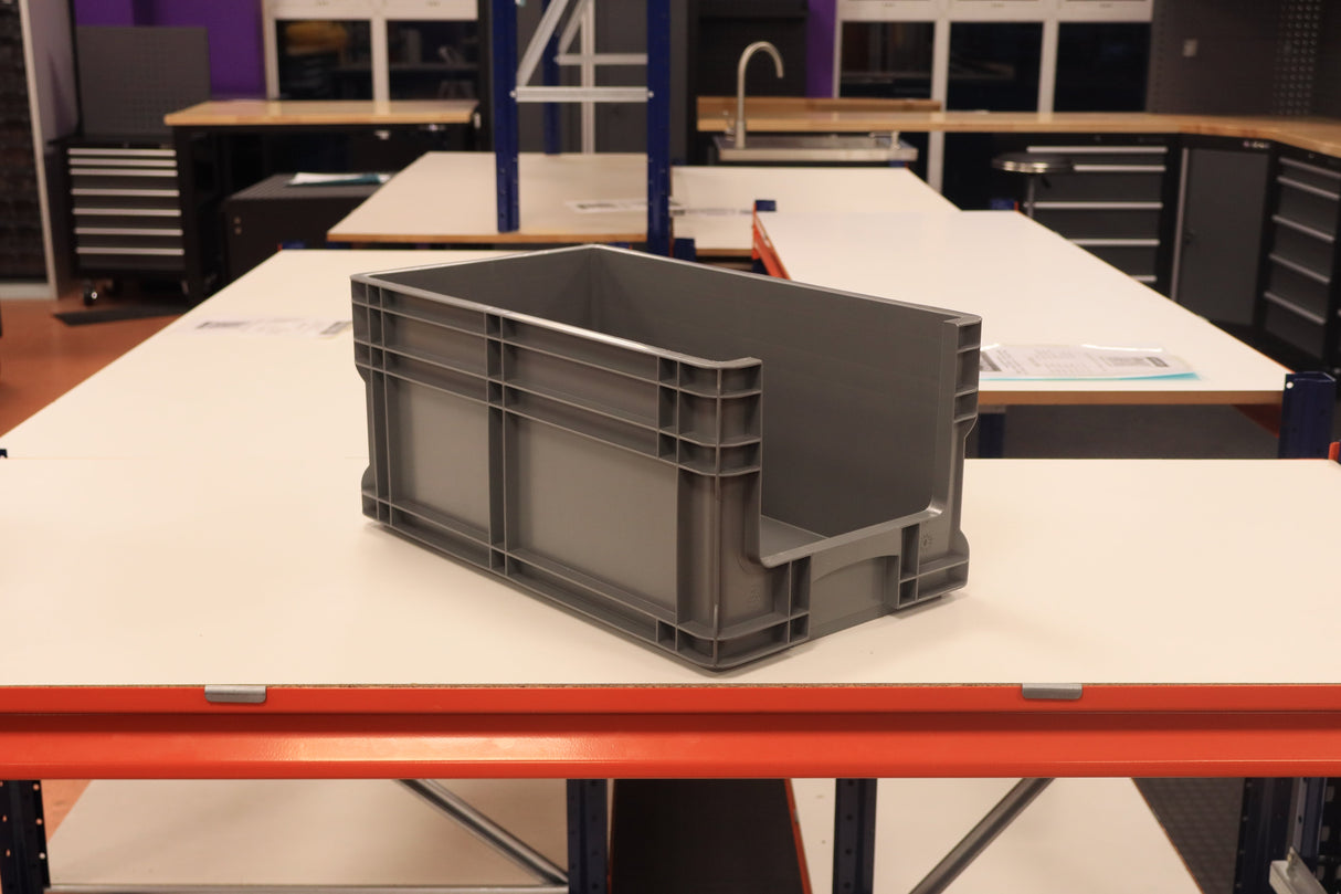 RackZone's 72 Grey Euro Picking Containers on a white workshop table.