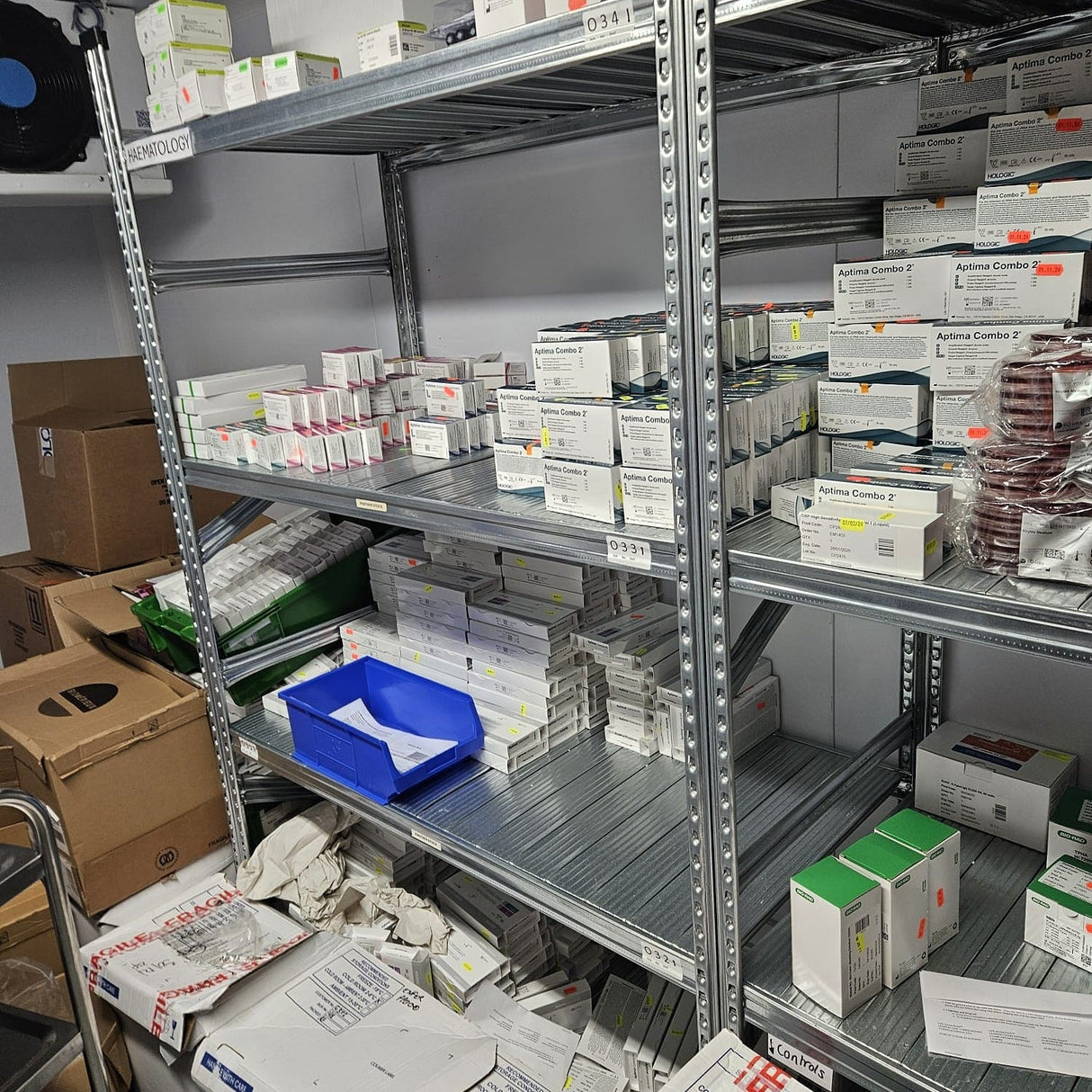RackZone Galvanised Shelving holds boxed medical supplies and packaging.