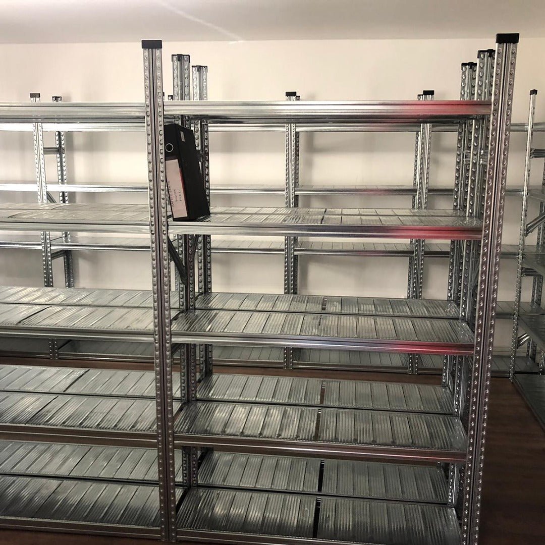 RackZone Galvanised Shelving 600mm Depth - Extender, one shelf holds a black binder.