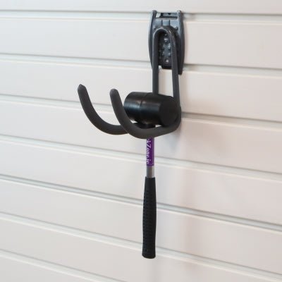 RackZone Slatwall Big Work Hook stores a rubber mallet on a slatwall panel.