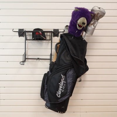 A Cleveland golf bag with llama cover hangs on a RackZone Slatwall Golf Rack.