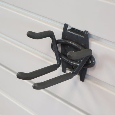 RackZone Slatwall Ski Rack mounts on white slatwall for ski storage.