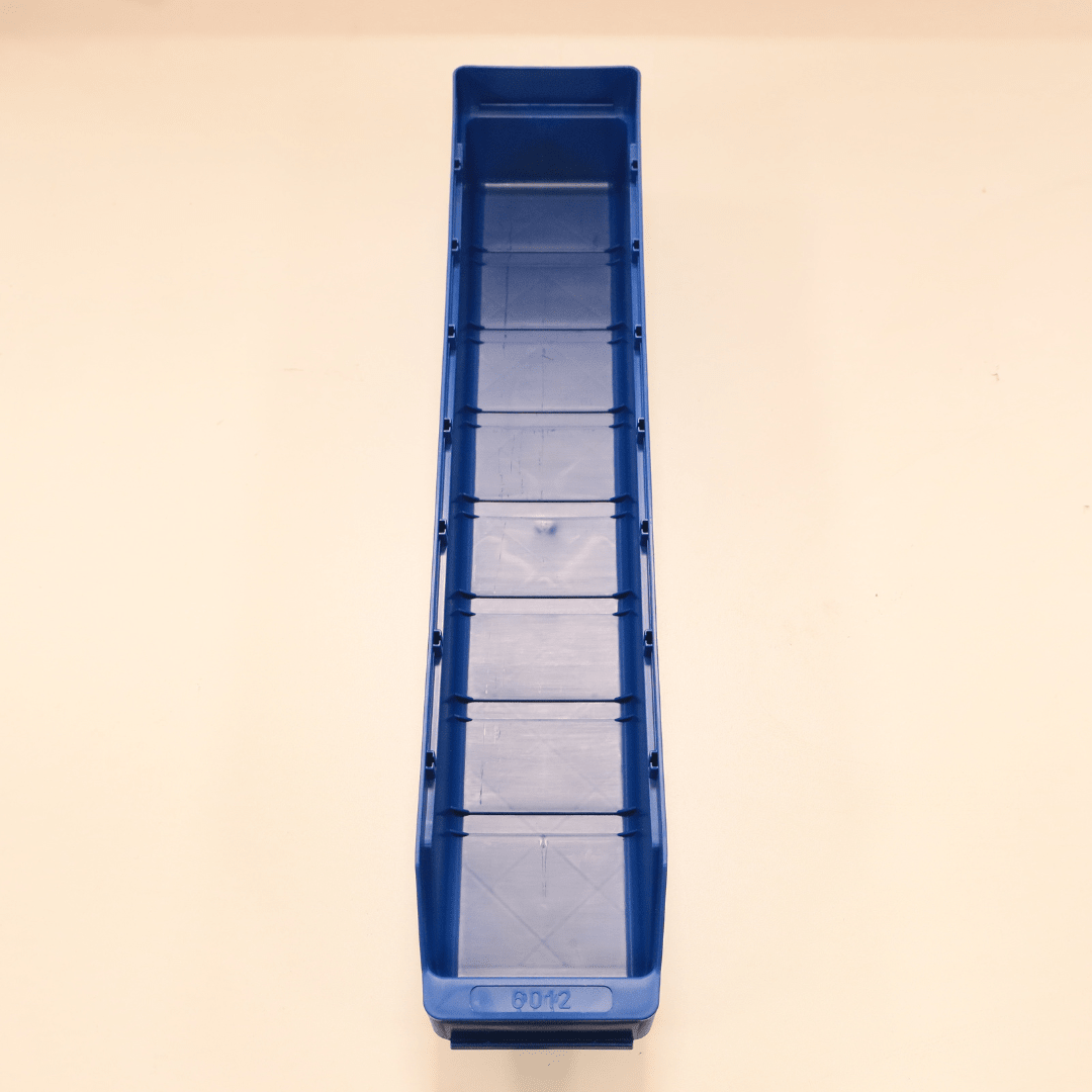 A blue RackZone Standard Shelf Bin ST6012 on a light surface.