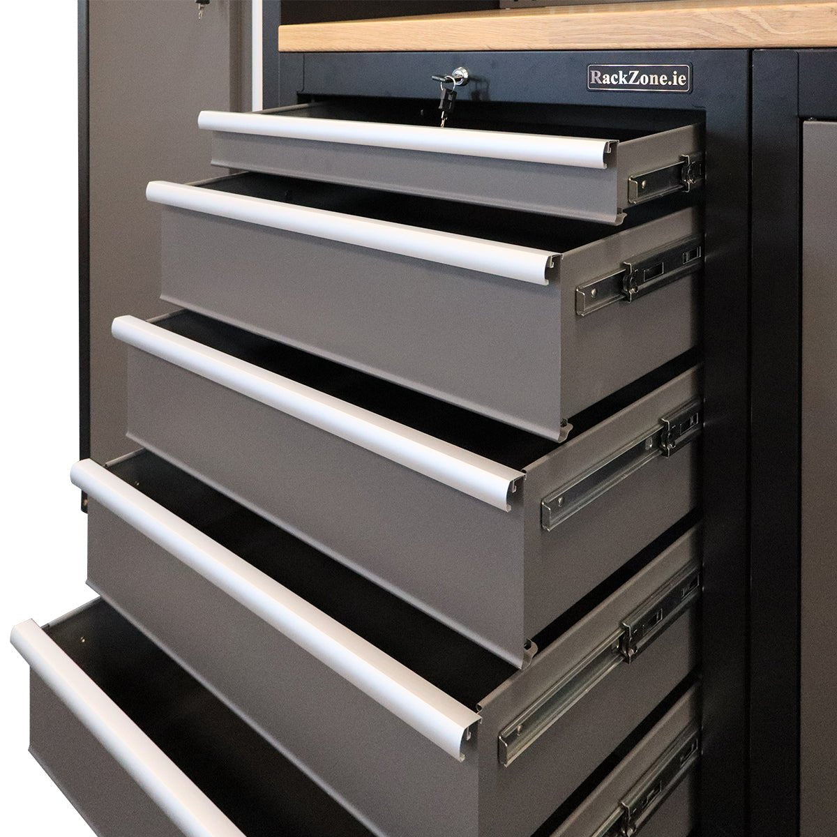 Five open drawers in the RackZone Modular Workstation System 7 cabinet.