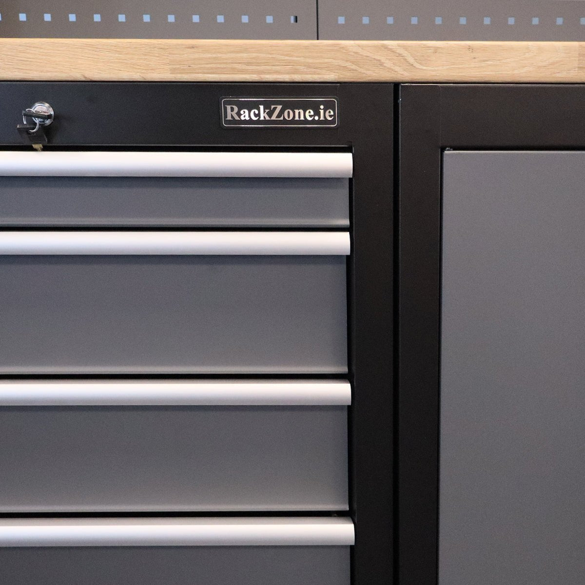 Close-up of RackZone Modular Workstation System 7 with four grey drawers.