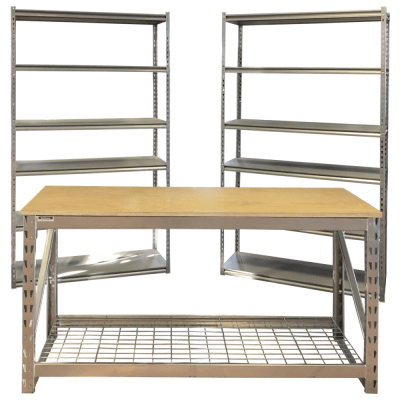 Three metal shelving units, two with multiple shelves and one in the center with a wooden work surface and a metal wire shelf underneath.