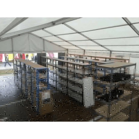 RackZone Value Shelving 5 Bay units installed under a large white event tent.