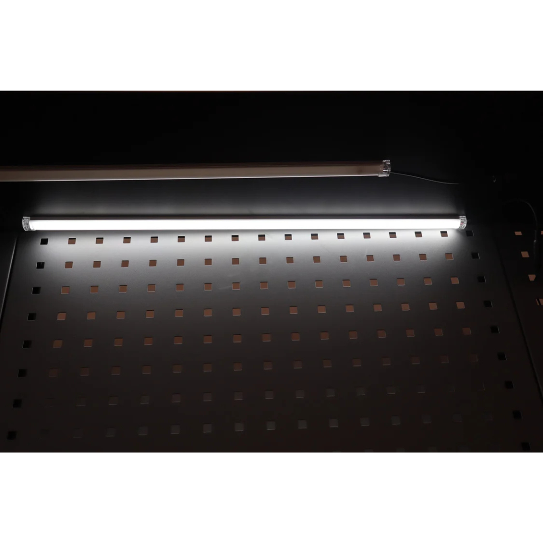 A RackZone Modular Workstation LED Light Set glows above the perforated surface.