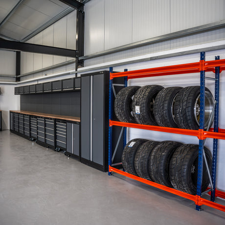 RackZone Tyre Racking 400mm Depth holds tires neatly beside garage tool cabinets.