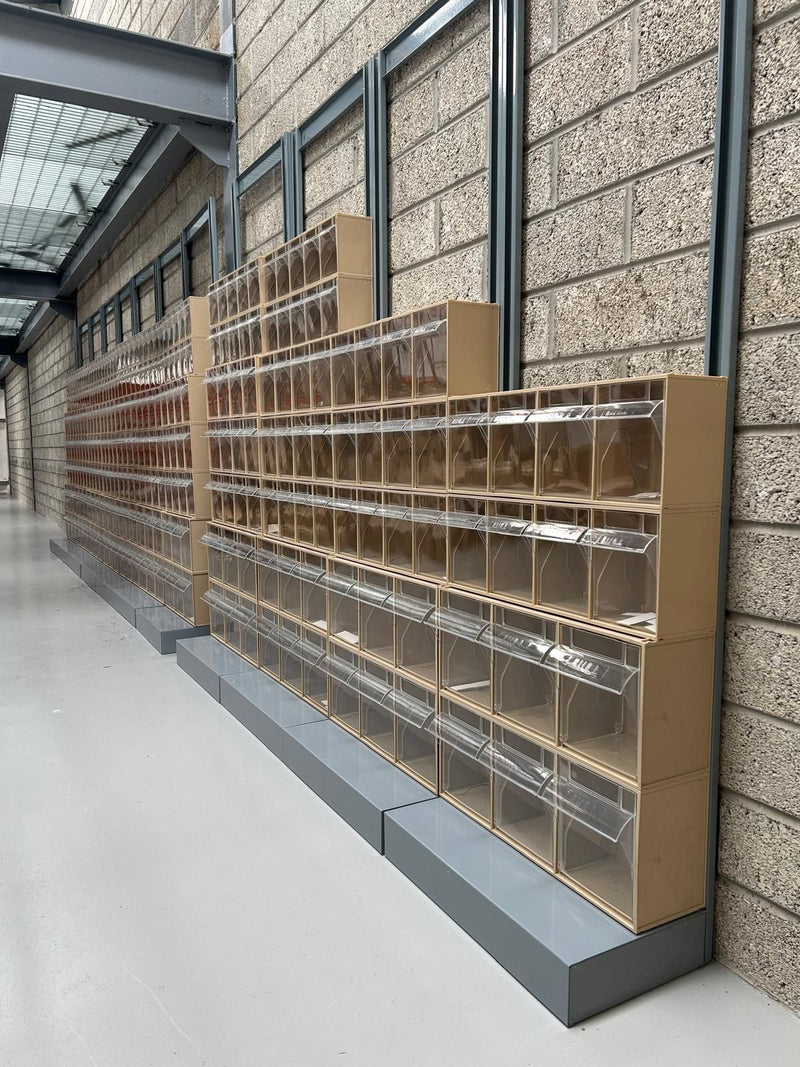 RackZone.ie tilt bins with bases and frames in a warehouse stores 