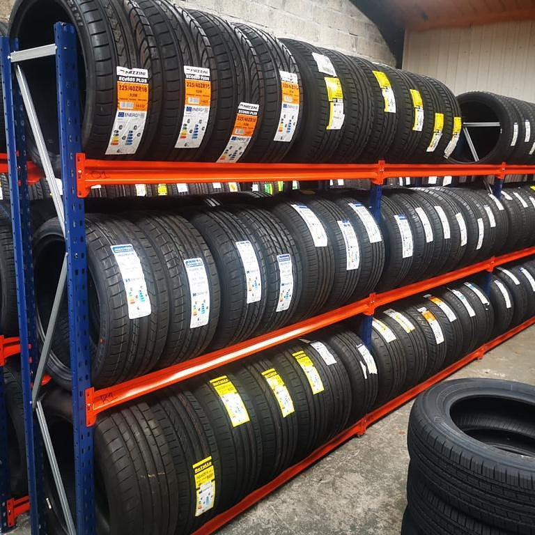 RackZone Tyre Racking 400mm Starter holds rows of labelled car tires in a garage.
