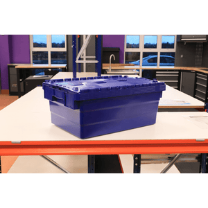 A RackZone 33L Attached Lid Container sits on a workbench in the workshop.