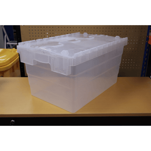 A RackZone 58L Attached Lid Container sits on a wooden surface for storage.