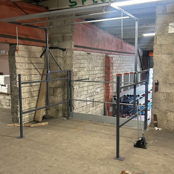 RackZone Up & Over Gate gives mezzanine edge protection with kickplate.