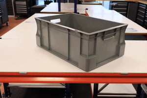 RackZone Pallet Deal: 45 Grey Euro Containers on a white table in workspace.
