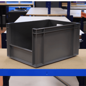 A RackZone Euro Picking Container 400x300x220 mm Grey sits on a workshop table.
