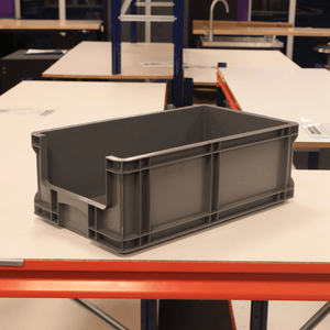 A RackZone Euro Picking Container 505x256x210mm Grey sits on a white table.