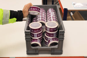 Someone puts RackZone tape into grey Euro Picking Containers (72 pack, pallet deal).