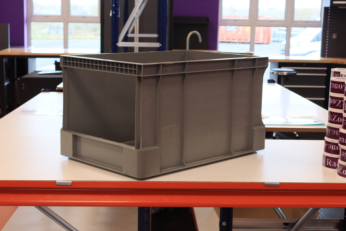 A RackZone Euro Picking Container sits on a white table in a well-lit room.