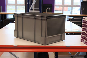 A RackZone Euro Picking Container 600x400x320mm Grey sits on a white table.