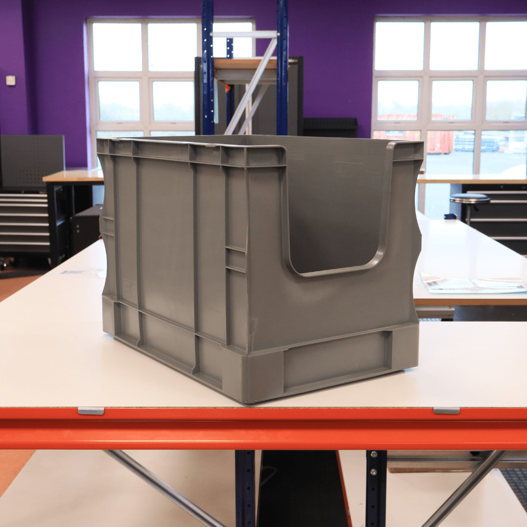 A RackZone Euro Picking Container 600x400x420mm Grey sits on a white table.
