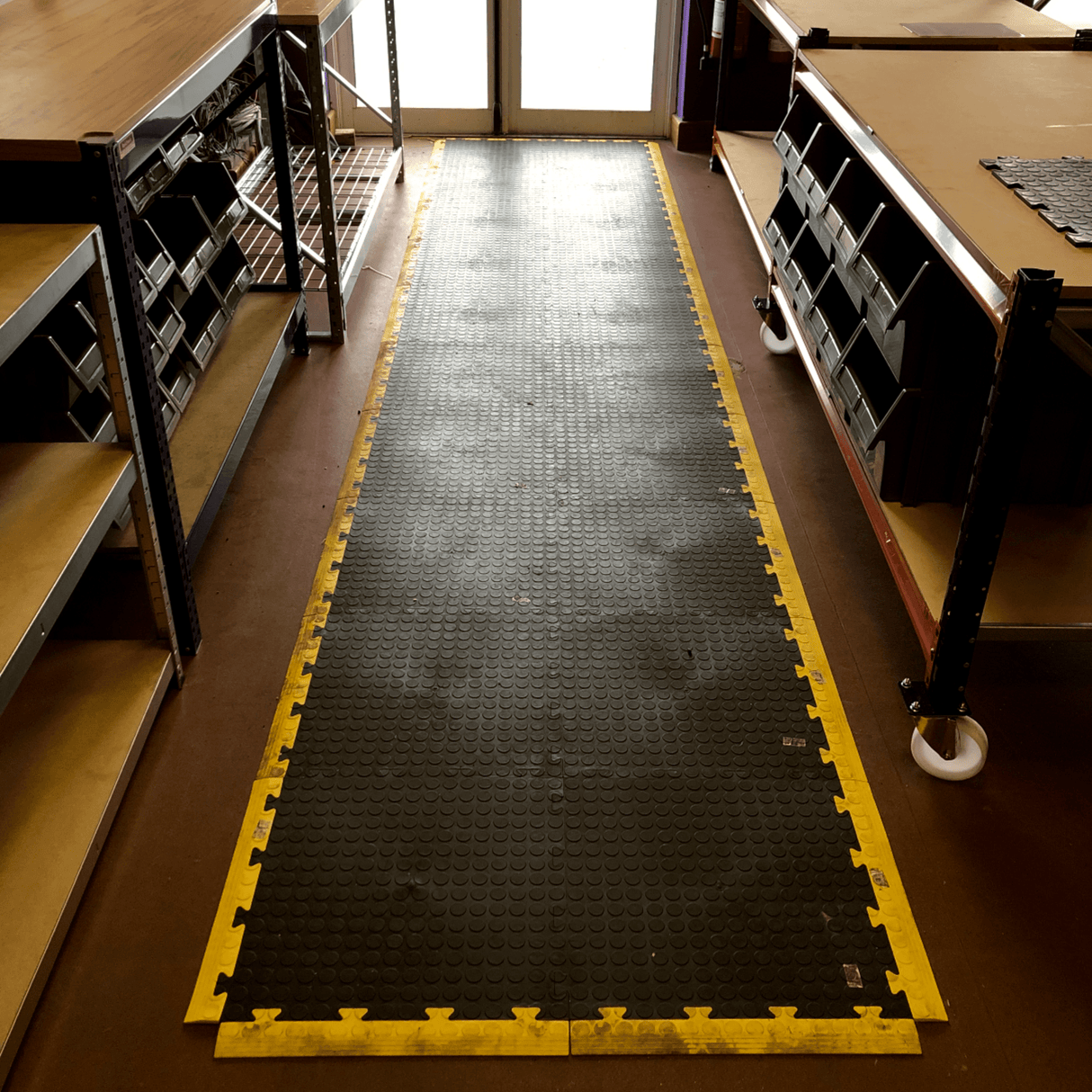 RackZone Vinyl Floor Edging Tiles BLACK (10-pack) protect floors between benches.
