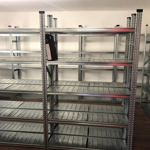 A single file binder sits on empty RackZone Galvanised Shelving, ready to use.