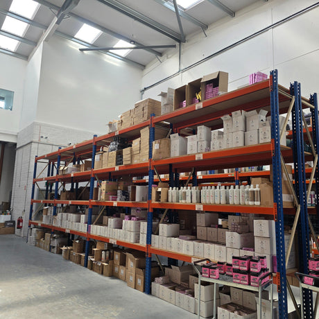 RackZone Longspan Shelving 600mm stocked with boxes and products in warehouse.