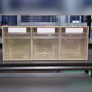 RackZone Storage Tilt Bin Madia 5: 3 clear-front bins with label slots on shelf.