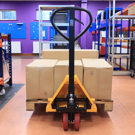 RackZone Pallet Truck, 2500kg, PU Wheels, 1150x550mm—ideal for warehouses.