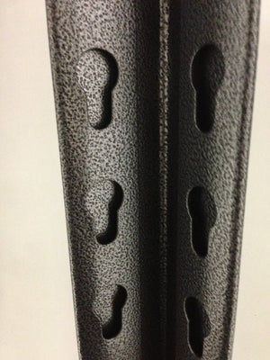Close-up of RackZone Rivet Shelving bars with keyhole slots in a vertical row.
