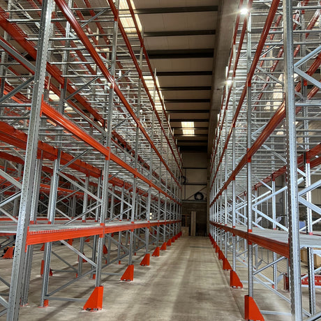 RackZone Pallet Racking 1100mm Depth Extender with orange beams and metal frames.