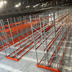 RackZone Pallet Racking 1100mm Extender with orange beams in a large warehouse.
