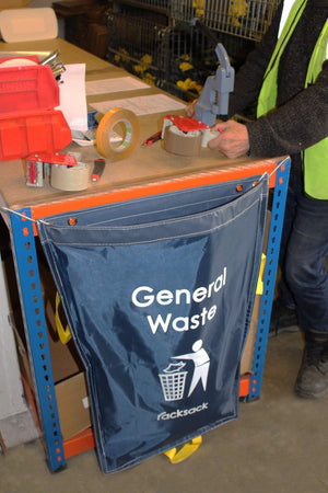 Person at workbench with RackZone Racksack Mini Mixed Paper & Cardboard – Blue.