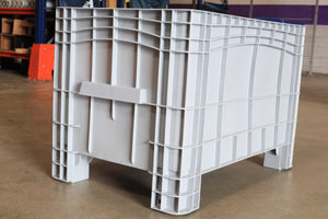 RackZone Stacking Container 984d x 625w x 665h Grey on a concrete indoor floor.