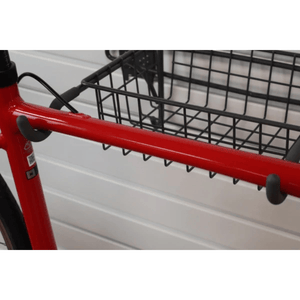 Close-up of a red bike with RackZone Slatwall Bike Rack and black basket attached.