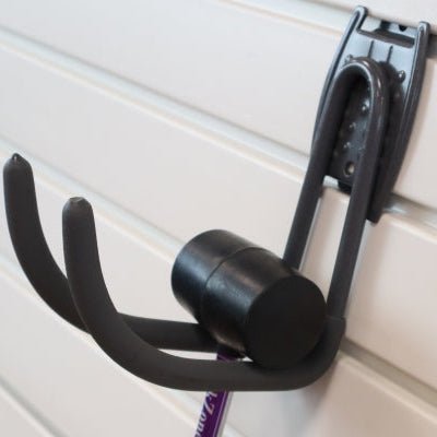 RackZone Slatwall Big Work Hook holds a rubber mallet; ideal for storage.