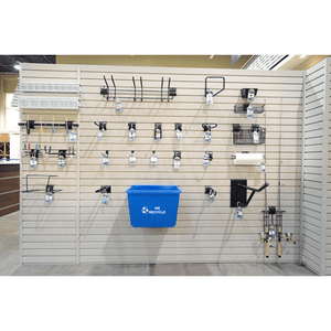 A white RackZone Slatwall PVC panel displays metal hooks, baskets, and a blue bin.