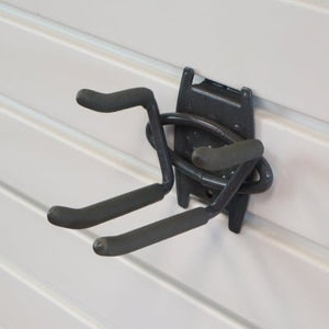 RackZone Slatwall Ski Rack mounts on white slatwall for ski storage.