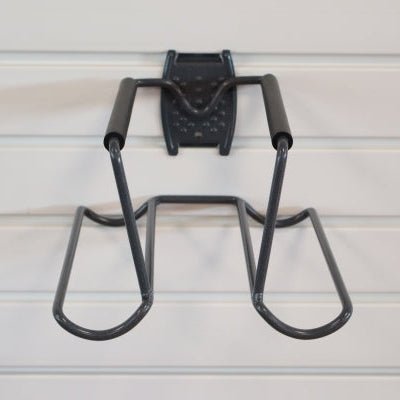 RackZone Slatwall Tennis Racket Rack with padded arms for wall storage.
