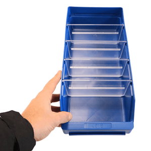A hand holds a RackZone Standard Shelf Bin ST4018 with five clear dividers.